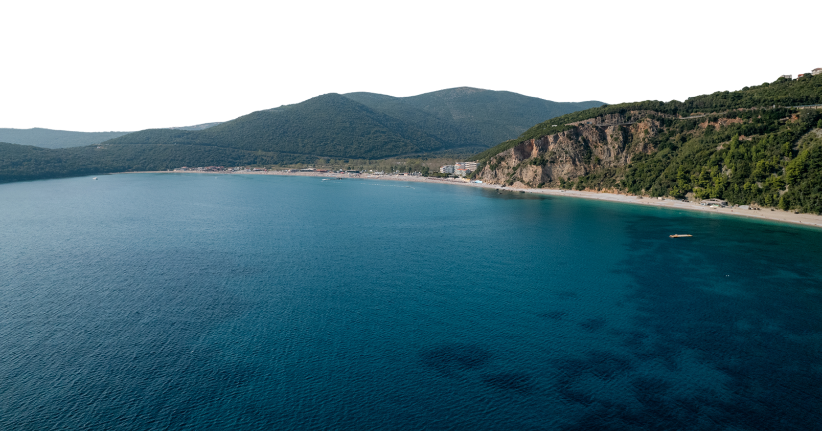 View of Jaz beach with mountains in the background